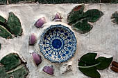 Bangkok Wat Arun - polychromatic mosaic flowers made from discarded ceramic pottery cut into petal shape.